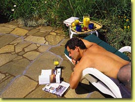 Clothing Optional Sunbathing in the secluded Pool Area